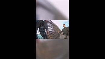Connecticut Police Officers rescue woman from bridge