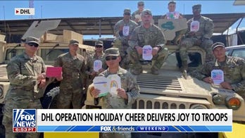 Delivery company delivers trees to deployed troops