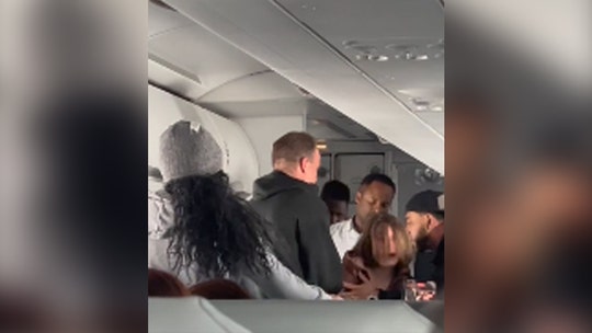 Flight descends into chaos when 'possessed' woman begins screaming, jumping over seats: 'There's a real devil'