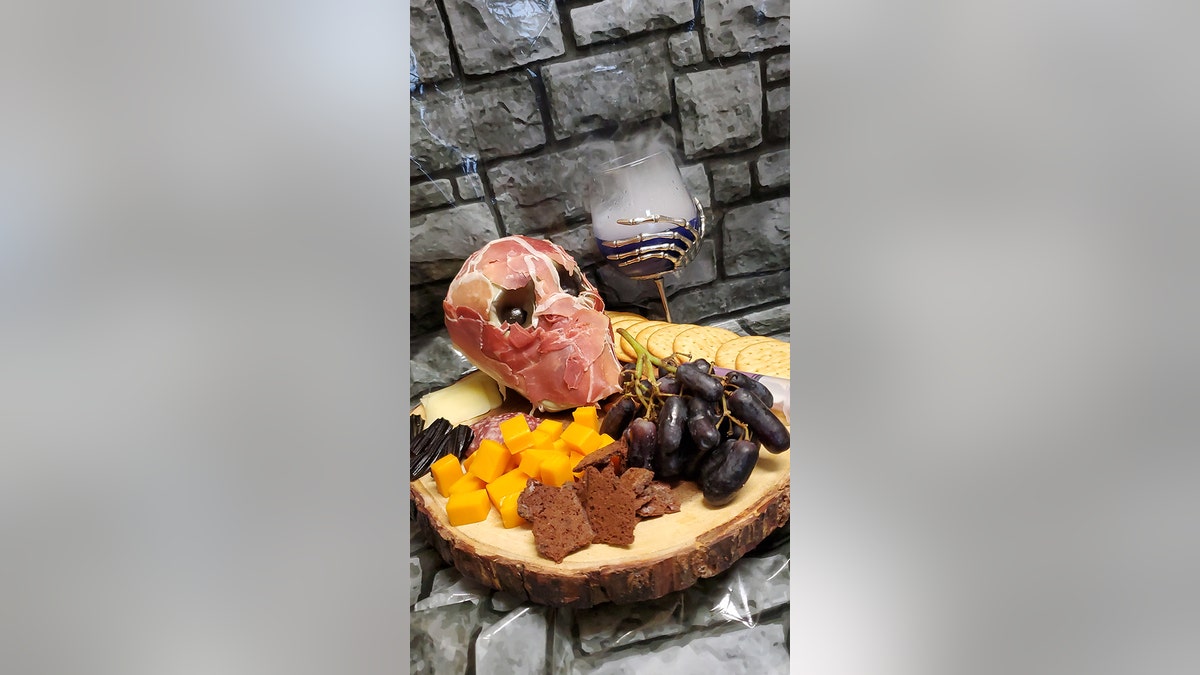 charcuterie board with skull