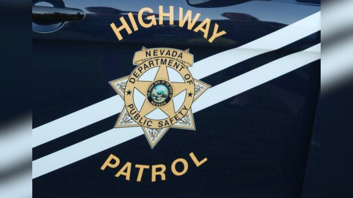 A Nevada State Trooper badge on the side of a car