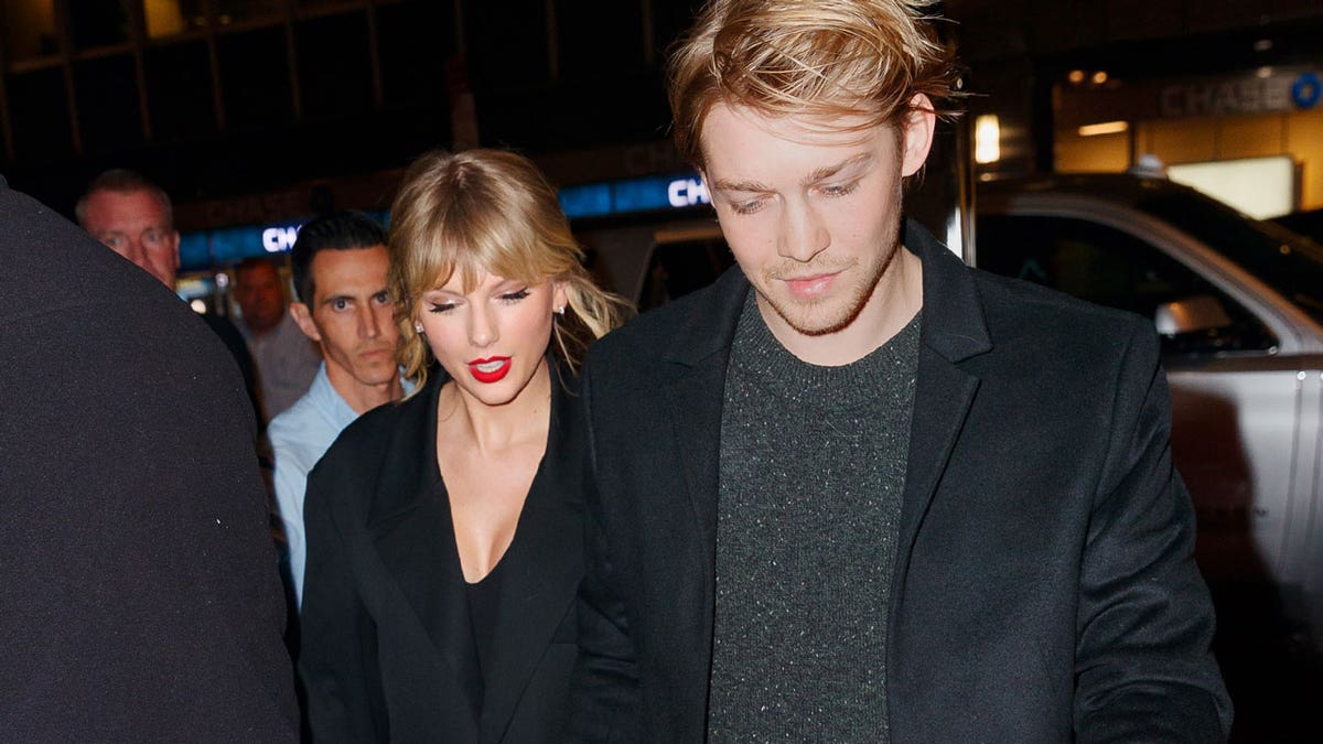 Taylor Swift and Joe Alwyn at an event